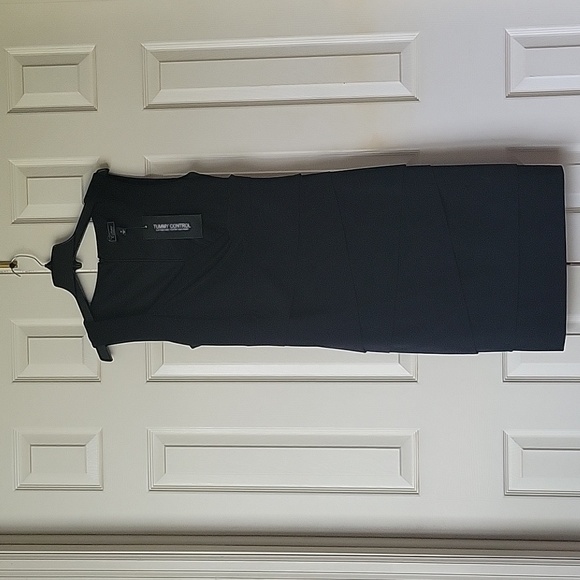 New with tags black sleeveless dress. Tummy control.  Stretchy material. - Picture 1 of 5